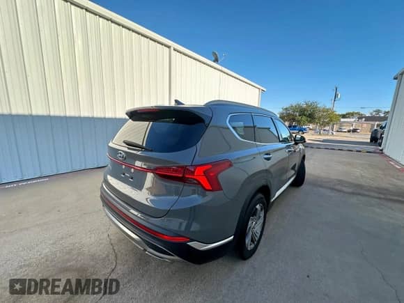 2021 Hyundai Santa Fe SEL с VIN 5NMS34AJ0MH310413, выставлен на аукционе Copart как лот 91517905 с пробегом 143 321 миль миль и Чистый • Clean title. История ставок и продаж доступна на DreamBid. Изображение 4.
