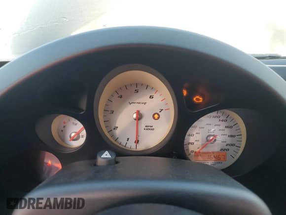 2006 Dodge Viper z VIN 1B3JZ69Z56V100512, wystawiony jako Copart lot #50794535 z przebiegiem 16 467 mil mil oraz Nie do naprawy • Non repairable. Historia ofert i sprzedaży dostępna na DreamBid. Obrazek 9.