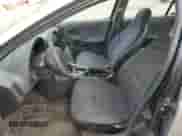 1999 Saturn SL with VIN 1G8ZH5286XZ266266, listed as a Copart auction lot 52543495 with 220,622 mi miles and Salvage title. Bid and sale history available at DreamBid. Image 7.