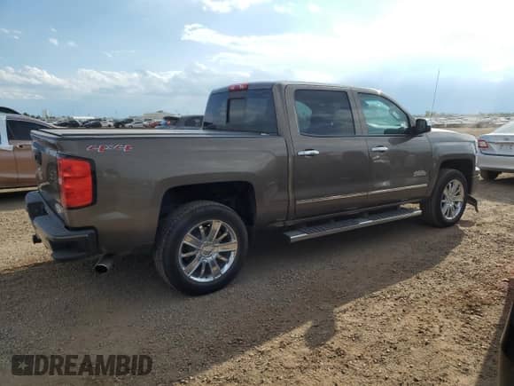 2014 Chevrolet Silverado 1500 High Country с VIN 3GCUKTEJ0EG558030, выставлен на аукционе Copart как лот 69486575 с пробегом 128 492 миль миль и Чистый • Clean title. История ставок и продаж доступна на DreamBid. Изображение 3.