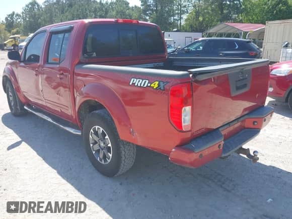 2014 Nissan Frontier S with VIN 1N6AD0EV3EN734085, listed as a IAAI auction lot 42007200 with Not provided miles and . Bid and sale history available at DreamBid. Image 3.