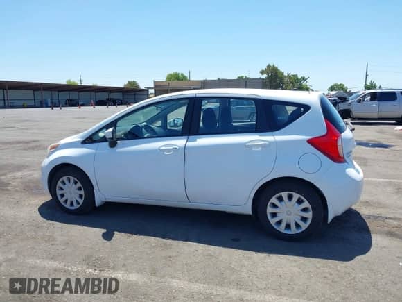 2015 Nissan Note SV z VIN 3N1CE2CP8FL415665, wystawiony jako IAAI lot #42842530 z przebiegiem 140 068 mil mil oraz . Historia ofert i sprzedaży dostępna na DreamBid. Obrazek 14.