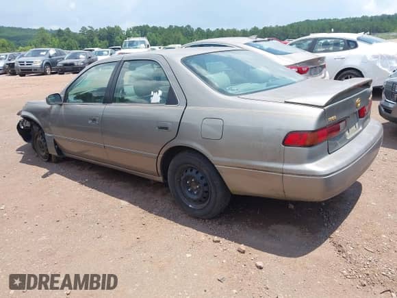 1997 Toyota Camry LE with VIN 4T1BG22K8VU056746, listed as a IAAI auction lot 42555616 with 100,471 mi miles and . Bid and sale history available at DreamBid. Image 3.