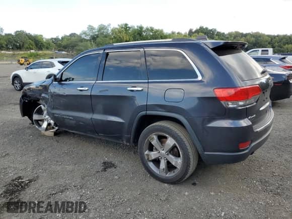 2014 Jeep Grand Cherokee Limited z VIN 1C4RJFBG3EC589231, wystawiony jako Copart lot #71021165 z przebiegiem 94 742 mil mil oraz Szkoda całkowita • Salvage title. Historia ofert i sprzedaży dostępna na DreamBid. Obrazek 2.