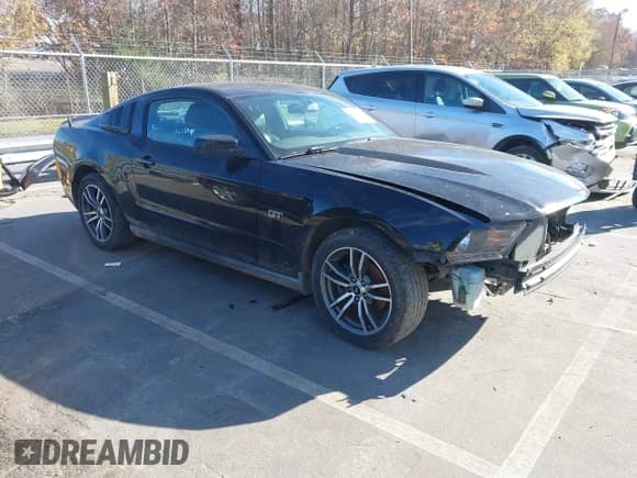 2010 Ford Mustang GT with VIN 1ZVBP8CHXA5118174, listed as a IAAI auction lot 40948682 with 180,126 mi miles and . Bid and sale history available at DreamBid. Image 1.