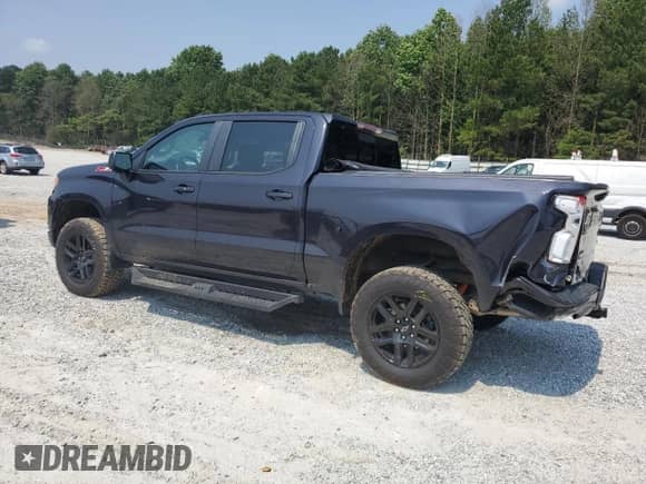 2022 Chevrolet Silverado 1500 RST with VIN 3GCUDEET3NG662986, listed as a Copart auction lot 59013585 with 26,141 mi miles and Salvage title. Bid and sale history available at DreamBid. Image 2.