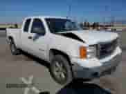 2007 GMC Sierra 1500 SLE1 with VIN 1GTEC19C87Z570530, listed as a Copart auction lot 60296765 with 215,143 mi miles and Salvage title. Bid and sale history available at DreamBid. Image 4.
