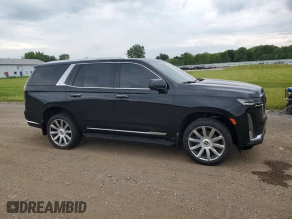 2021 Cadillac Escalade Premium Luxury with VIN 1GYS4BKL4MR474562, listed as a Copart auction lot 62931635 with 59,641 mi miles and Salvage title. Bid and sale history available at DreamBid. Image 4.