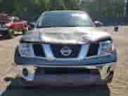 2006 Nissan Frontier SE z VIN 1N6AD06W66C403523, wystawiony jako Copart lot #65054395 z przebiegiem 151 766 mil mil oraz Szkoda całkowita • Salvage title. Historia ofert i sprzedaży dostępna na DreamBid. Obrazek 5.