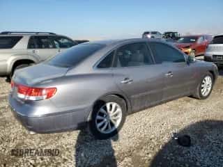 2006 Hyundai Azera SE с VIN KMHFC46F56A123232, выставлен на аукционе Copart как лот 88720625 с пробегом 170 833 миль миль и Списание • Salvage title. История ставок и продаж доступна на DreamBid. Изображение 3.