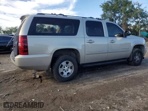 2007 Chevrolet Suburban LT with VIN 1GNFK163X7J224481, listed as a Copart auction lot 82161425 with 126,691 mi miles and Salvage title. Bid and sale history available at DreamBid. Image 3.