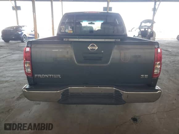 2007 Nissan Frontier SE with VIN 1N6AD07U67C431739, listed as a Copart auction lot 86591175 with 131,668 mi miles and Salvage title. Bid and sale history available at DreamBid. Image 6.