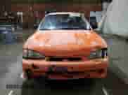1997 Hyundai Accent z VIN KMHVD14NXVU221266, wystawiony jako Copart lot #86383044 z przebiegiem 159 517 mil mil oraz Szkoda całkowita • Salvage title. Historia ofert i sprzedaży dostępna na DreamBid. Obrazek 5.
