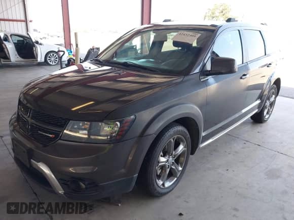 2017 Dodge Journey Crossroad Plus with VIN 3C4PDDGG0HT563092, listed as a IAAI auction lot 42432409 with 148,358 mi miles and . Bid and sale history available at DreamBid. Image 2.