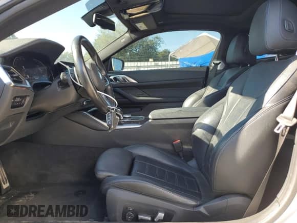 2021 BMW 4 Series 430i z VIN WBA53AP01MCG52316, wystawiony jako Copart lot #71084555 z przebiegiem 32 046 mil mil oraz Czysty tytuł • Clean title. Historia ofert i sprzedaży dostępna na DreamBid. Obrazek 7.