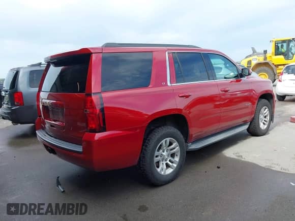 2015 Chevrolet Tahoe LT z VIN 1GNSKBKC9FR126438, wystawiony jako IAAI lot #43276273 z przebiegiem 92 503 mil mil oraz . Historia ofert i sprzedaży dostępna na DreamBid. Obrazek 4.