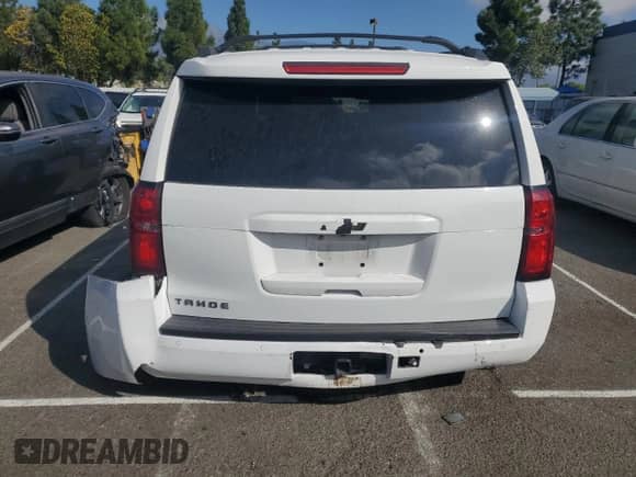 2019 Chevrolet Tahoe LS with VIN 1GNSCAEC6KR153562, listed as a Copart auction lot 82231855 with 71,474 mi miles and Salvage title. Bid and sale history available at DreamBid. Image 6.