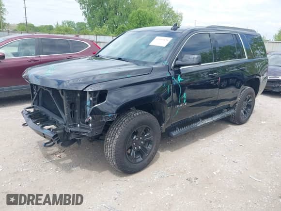 2018 Chevrolet Tahoe LS z VIN 1GNSKAKC0JR362060, wystawiony jako IAAI lot #42193424 z przebiegiem 73 805 mil mil oraz . Historia ofert i sprzedaży dostępna na DreamBid. Obrazek 2.