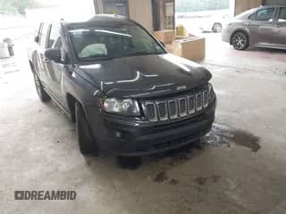 2014 Jeep Compass Latitude with VIN 1C4NJCEA4ED647894, listed as a IAAI auction lot 42893254 with 143,768 mi miles and . Bid and sale history available at DreamBid. Image 1.