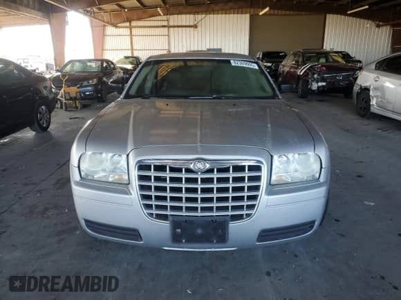 2007 Chrysler 300 with VIN 2C3KA43R37H785728, listed as a Copart auction lot 82369005 with 140,326 mi miles and Salvage title. Bid and sale history available at DreamBid. Image 5.