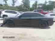 2020 Dodge Charger SXT with VIN 2C3CDXBGXLH111034, listed as a IAAI auction lot 43145196 with 176,394 mi miles and . Bid and sale history available at DreamBid. Image 14.