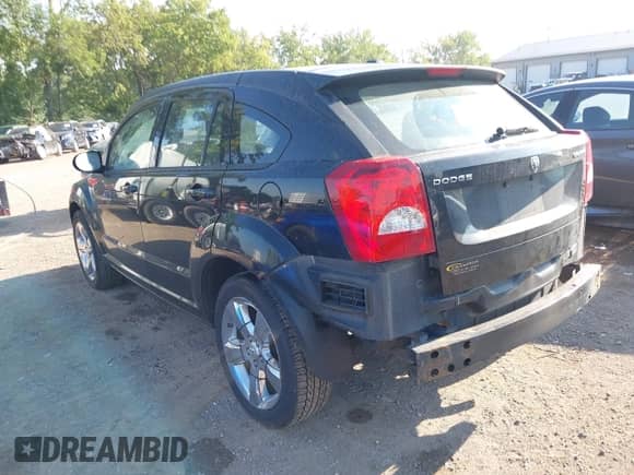 2011 Dodge Caliber Uptown with VIN 1B3CB9HB2BD172349, listed as a IAAI auction lot 42901430 with 141,201 mi miles and . Bid and sale history available at DreamBid. Image 3.