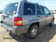 1996 Jeep Grand Cherokee with VIN 1J4EZ58S5TC149533, listed as a IAAI auction lot 42456529 with 173,872 mi miles and . Bid and sale history available at DreamBid. Image 4.