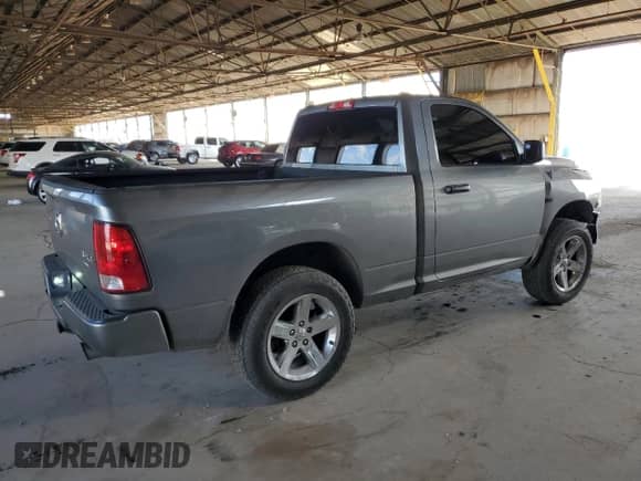 2012 Ram 1500 Express with VIN 3C6JD7ATXCG271150, listed as a Copart auction lot 52627305 with 78,311 mi miles and Salvage title. Bid and sale history available at DreamBid. Image 3.