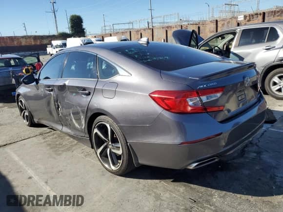 2018 Honda Accord Sport z VIN 1HGCV1F3XJA115692, wystawiony jako Copart lot #86603475 z przebiegiem 117 882 mil mil oraz Szkoda całkowita • Salvage title. Historia ofert i sprzedaży dostępna na DreamBid. Obrazek 2.