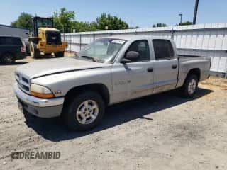 2000 Dodge Dakota Sport with VIN 1B7GL2AN9YS640848, listed as a Copart auction lot 60572935 with 154,201 mi miles and Clean title. Bid and sale history available at DreamBid. Image 1.
