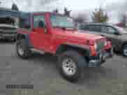 2001 Jeep Wrangler Sport with VIN 1J4FA49S11P339047, listed as a Copart auction lot 85923625 with 144,267 mi miles and Salvage title. Bid and sale history available at DreamBid. Image 4.