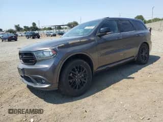 2015 Dodge Durango R/T with VIN 1C4SDHCT9FC201310, listed as a Copart auction lot 67858265 with 96,455 mi miles and Salvage title. Bid and sale history available at DreamBid. Image 1.