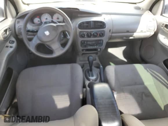 2005 Dodge Neon SXT with VIN 1B3ES56C05D171072, listed as a Copart auction lot 61170435 with 218,495 mi miles and Salvage title. Bid and sale history available at DreamBid. Image 8.