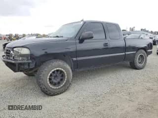 2005 GMC Sierra 1500 SLE с VIN 2GTEC19T451307165, выставлен на аукционе Copart как лот 56065925 с пробегом 205 883 миль миль и Списание • Salvage title. История ставок и продаж доступна на DreamBid. Изображение 1.