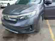 2019 Honda Pilot EX-L z VIN 5FNYF6H5XKB018384, wystawiony jako IAAI lot #43167792 z przebiegiem Nie podano mil oraz . Historia ofert i sprzedaży dostępna na DreamBid. Obrazek 17.