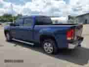 2013 GMC Sierra 1500 SLT with VIN 3GTP2WE77DG161822, listed as a Copart auction lot 63851855 with 169,146 mi miles and Salvage title. Bid and sale history available at DreamBid. Image 2.