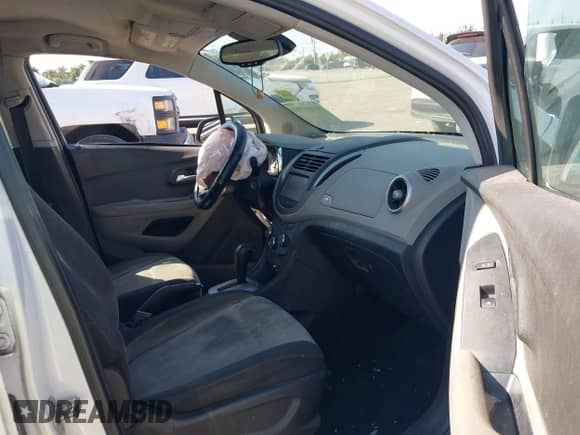 2016 Chevrolet Trax LS with VIN 3GNCJKSB7GL264728, listed as a IAAI auction lot 41803981 with 104,256 mi miles and . Bid and sale history available at DreamBid. Image 5.