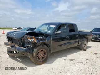 2001 Dodge Dakota Sport with VIN 1B7GL2AX71S155759, listed as a Copart auction lot 59165735 with 276,247 mi miles and Salvage title. Bid and sale history available at DreamBid. Image 1.