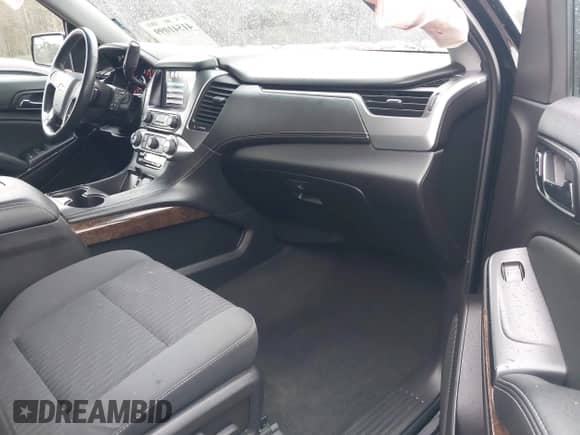 2016 Chevrolet Tahoe LS z VIN 1GNSKAKCXGR458352, wystawiony jako IAAI lot #41541099 z przebiegiem 93 879 mil mil oraz . Historia ofert i sprzedaży dostępna na DreamBid. Obrazek 5.