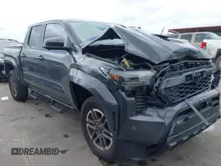 2024 Toyota Tacoma SR5 with VIN 3TMLB5JN2RM051282, listed as a IAAI auction lot 42370502 with 3,932 mi miles and . Bid and sale history available at DreamBid. Image 1.