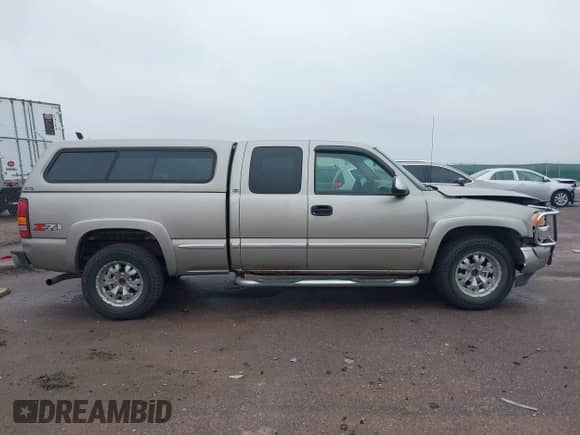 2002 GMC Sierra 1500 SLE z VIN 2GTEK19TX21147176, wystawiony jako IAAI lot #42548008 z przebiegiem 308 911 mil mil oraz . Historia ofert i sprzedaży dostępna na DreamBid. Obrazek 14.