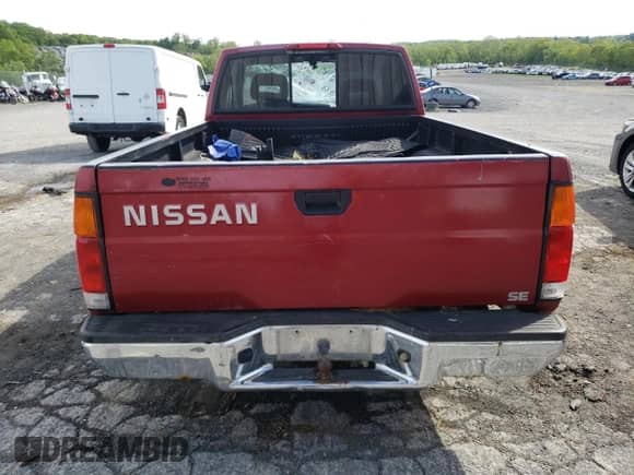 1996 Nissan Frontier XE with VIN 1N6SD16S8TC335129, listed as a Copart auction lot 55884495 with 313,757 mi miles and Salvage title. Bid and sale history available at DreamBid. Image 6.