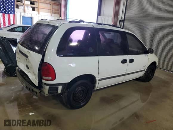 2000 Dodge Caravan with VIN 2B4GP25G4YR791420, listed as a Copart auction lot 83426754 with 141,635 mi miles and Salvage title. Bid and sale history available at DreamBid. Image 3.
