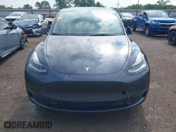 2023 Tesla Model Y Long Range with VIN 7SAYGDEE4PA202135, listed as a IAAI auction lot 42975478 with 27,065 mi miles and . Bid and sale history available at DreamBid. Image 13.