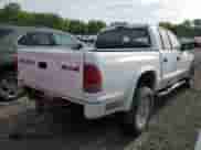 2002 Dodge Dakota SLT with VIN 1B7HG48N12S551650, listed as a Copart auction lot 49324025 with 183,653 mi miles and Salvage title. Bid and sale history available at DreamBid. Image 3.