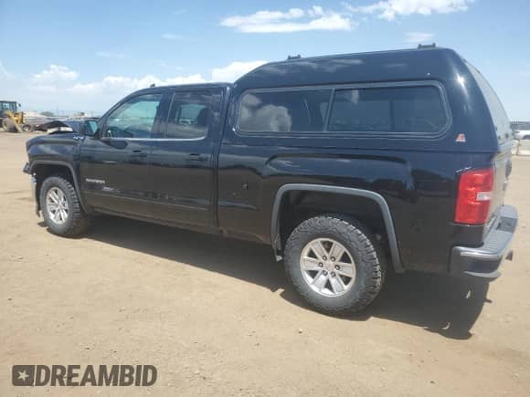 2019 GMC Sierra 1500 SLE with VIN 2GTV2MECXK1127002, listed as a Copart auction lot 61127735 with 63,923 mi miles and Salvage title. Bid and sale history available at DreamBid. Image 2.