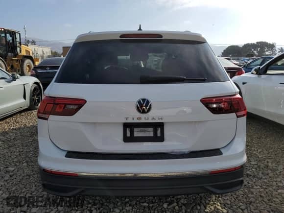 2023 Volkswagen Tiguan S с VIN 3VVRB7AX7PM054586, выставлен на аукционе Copart как лот 84275455 с пробегом 40 225 миль миль и Списание • Salvage title. История ставок и продаж доступна на DreamBid. Изображение 6.