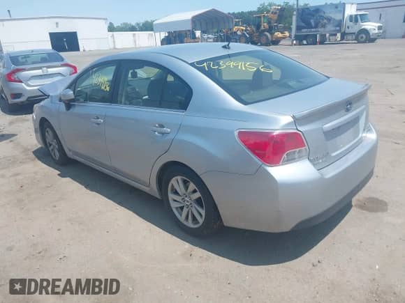 2016 Subaru Impreza Premium with VIN JF1GJAB64GH006713, listed as a IAAI auction lot 42399156 with 106,030 mi miles and . Bid and sale history available at DreamBid. Image 3.