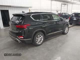 2019 Hyundai Santa Fe SEL с VIN 5NMS3CAD6KH061598, выставлен на аукционе IAAI как лот 43055818 с пробегом 92 489 миль миль и . История ставок и продаж доступна на DreamBid. Изображение 4.