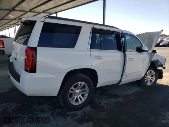 2015 Chevrolet Tahoe LT with VIN 1GNSKBKC2FR182883, listed as a Copart auction lot 70604715 with Not provided miles and Salvage title. Bid and sale history available at DreamBid. Image 3.